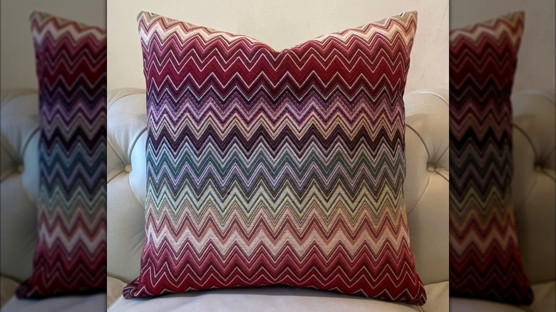 Zigzag print throw pillow sitting on couch