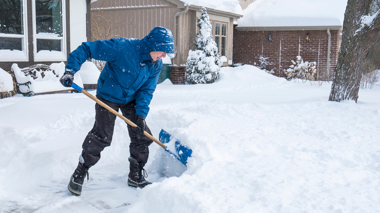 Person shoveling snow