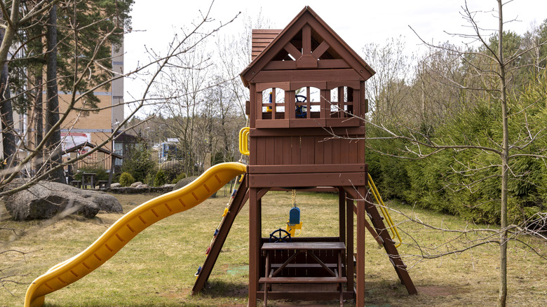 Outdoor playset with a slide