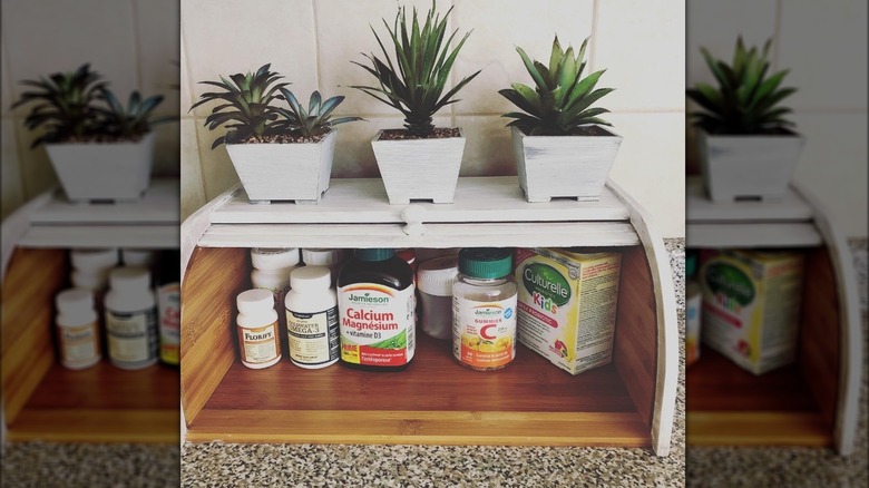 Breadbox turned into a medicine cabinet 