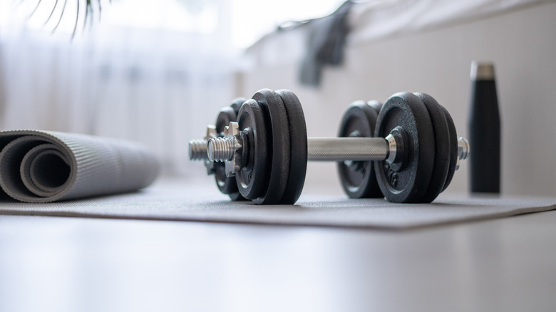 Dumbell on yoga mat