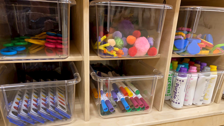 Kid supplies in clear bins