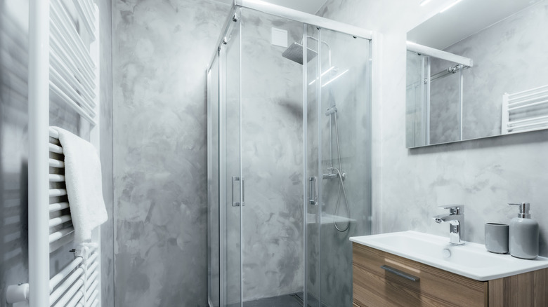 grey plaster shower walls