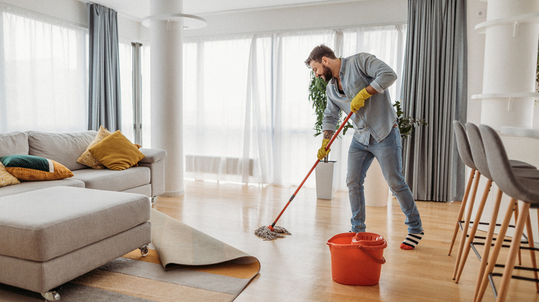 Person mopping floor