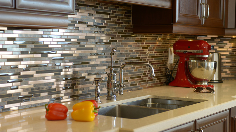 A metallic backsplash in a kitchen