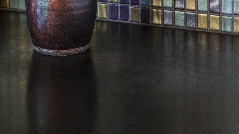 A colorful glass tile backsplash in a kitchen