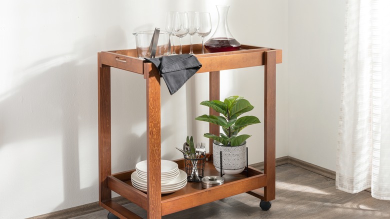 Wooden bar cart in home