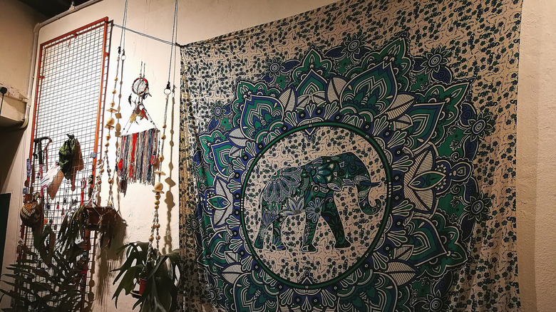 hanging tapestry in room