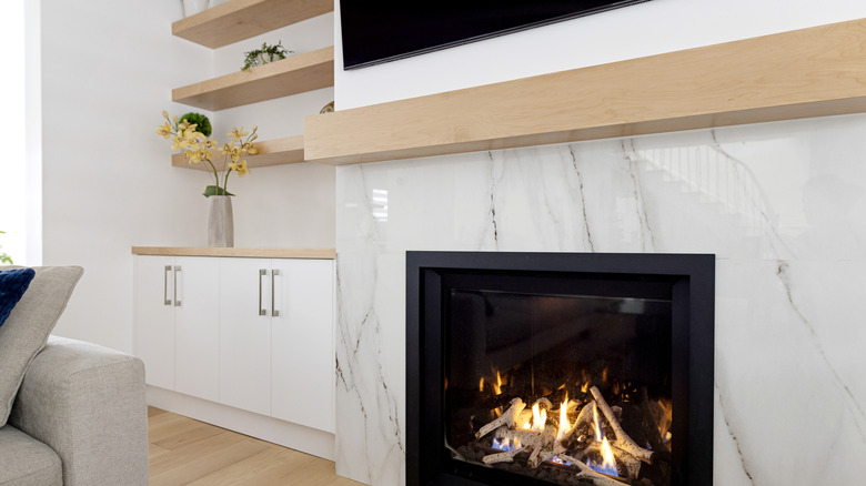 Unique indoor fireplace with marble mantel