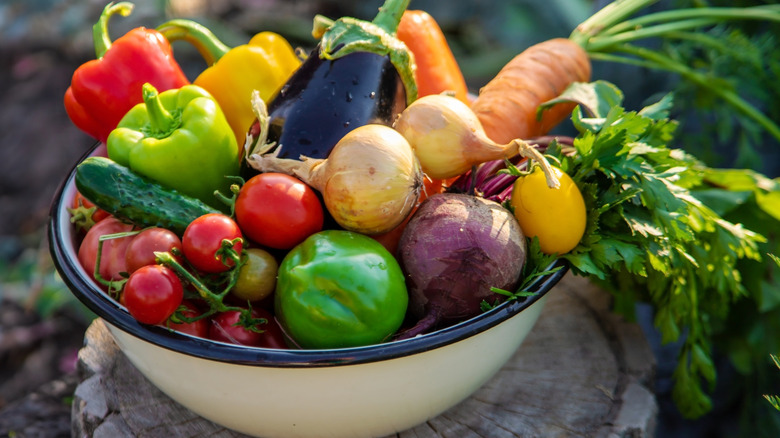 Fruits and vegetables in a white bowl