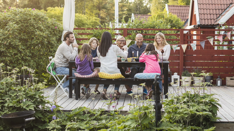 Smiling family on patio