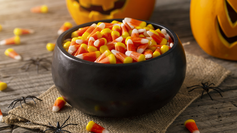 candy corn in black bowl