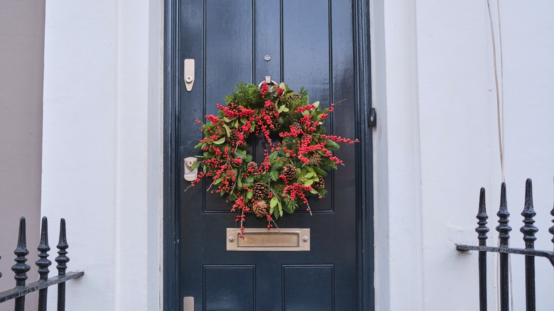 Bright holiday wreath on front door