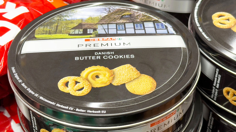 Cookie tins on display in a supermarket