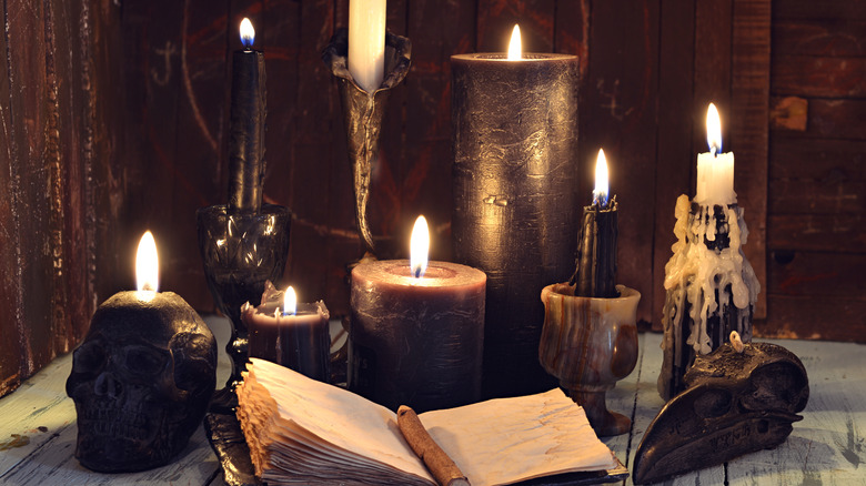 Spooky candles and book