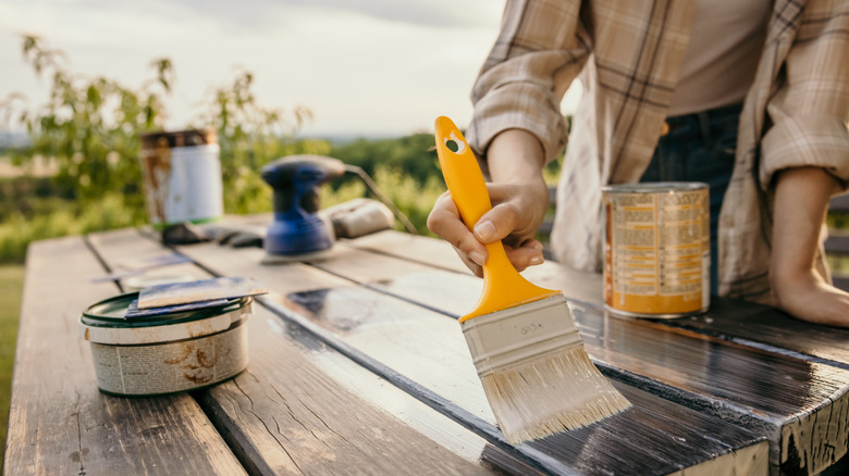 staining wooden portable grilling station