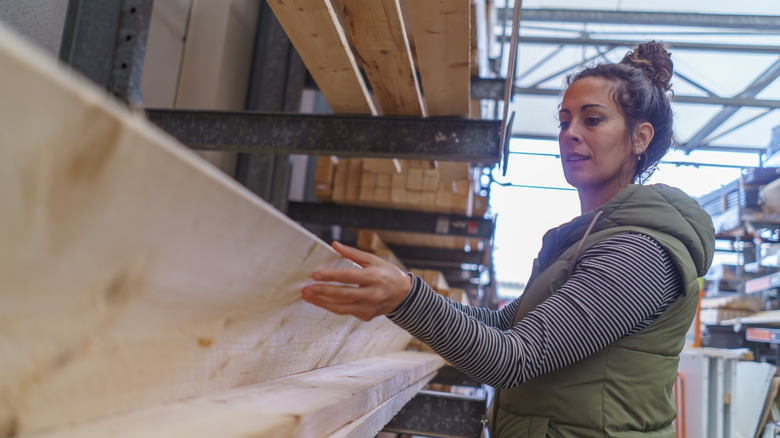 Woman buying lumber