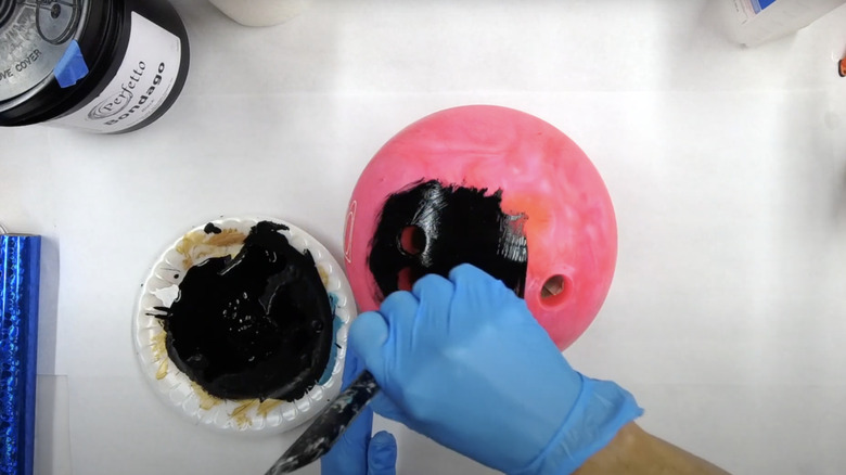 hand painting bowling ball black