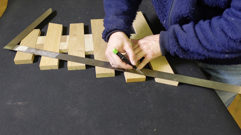 Preparing wood slats to DIY a tree.