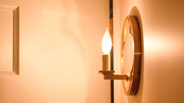 Candle style wall sconce