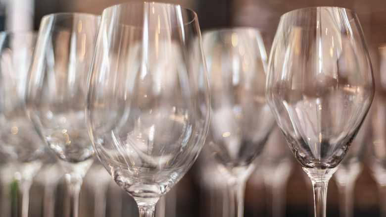 Assortment of empty wine glasses