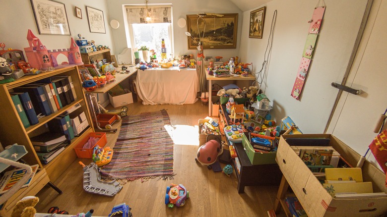 Messy playroom with many toys