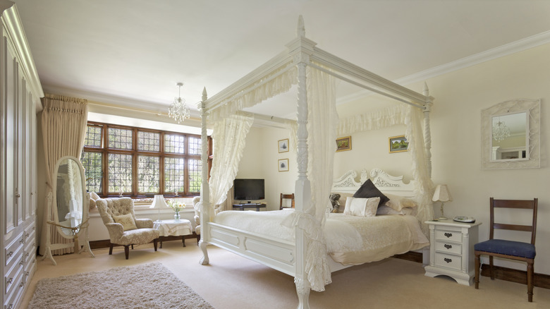 Canopy bed in neutral bedroom