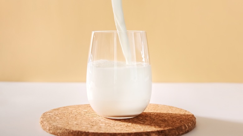 Pouring milk into glass