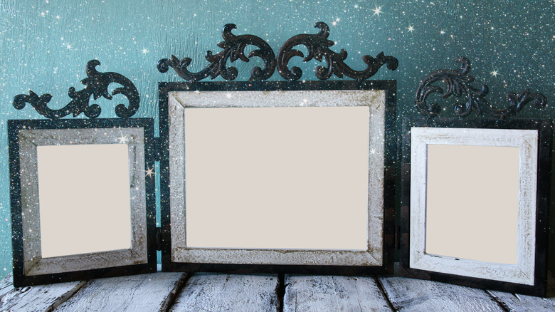 Line of metal decorative picture frames