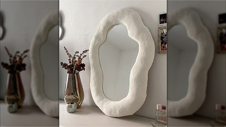 mirror with white clay frame