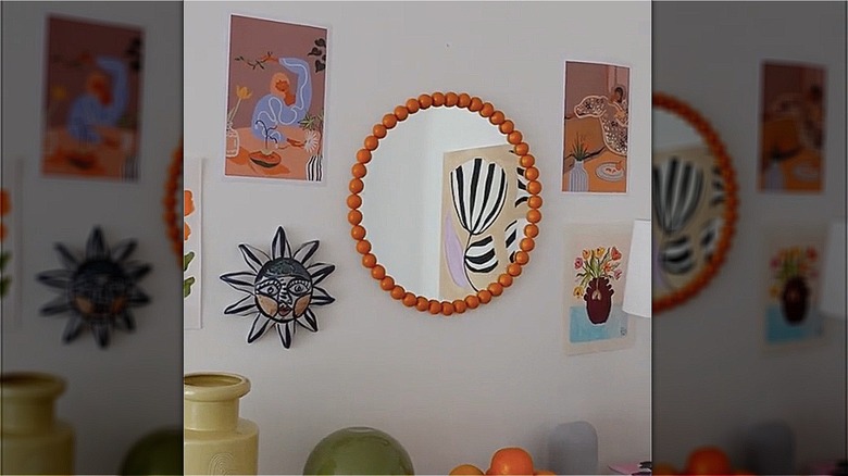 circle mirror with orange beaded border