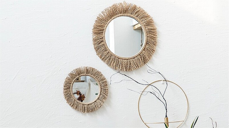 two circular mirrors with macrame frame