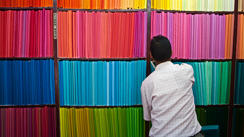 Man shopping for fabric 