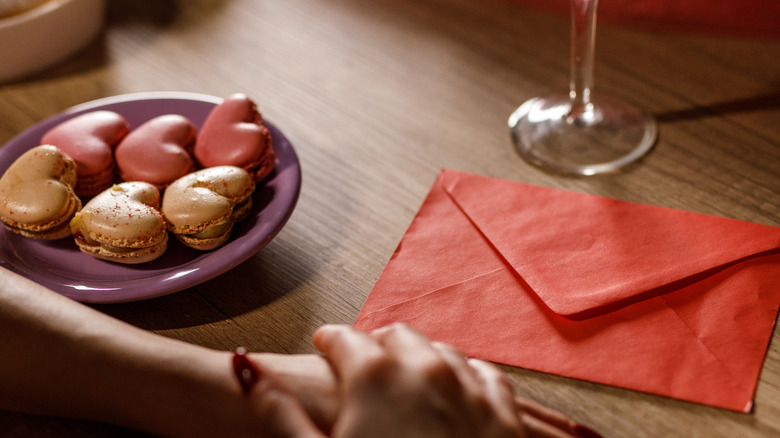 Red love letter and macaroons 