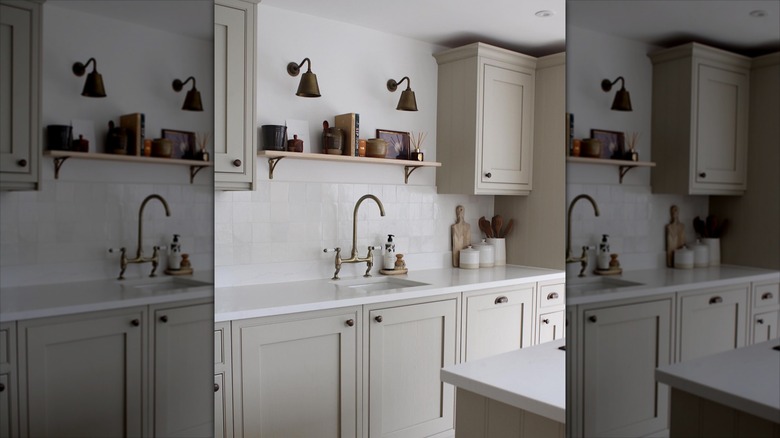 Wall sconces on kitchen shelf