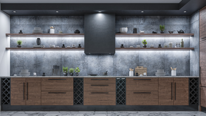 A luxury kitchen with floating shelves lit from beneath