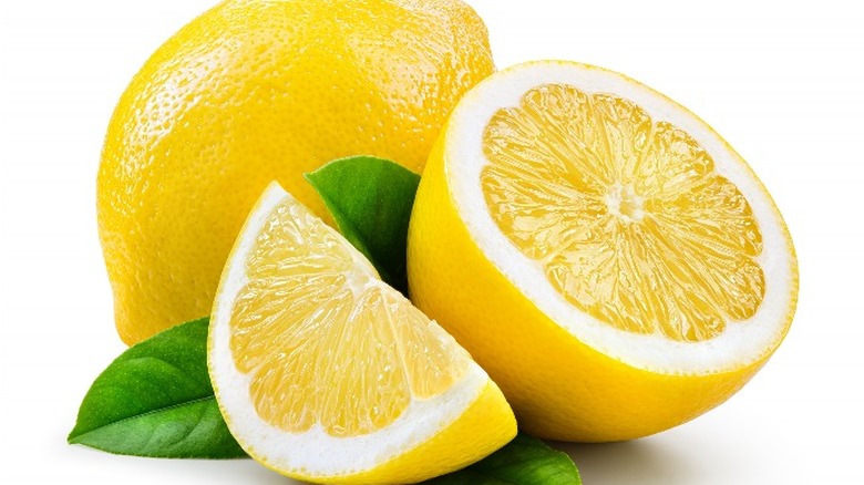 Cut and whole lemons