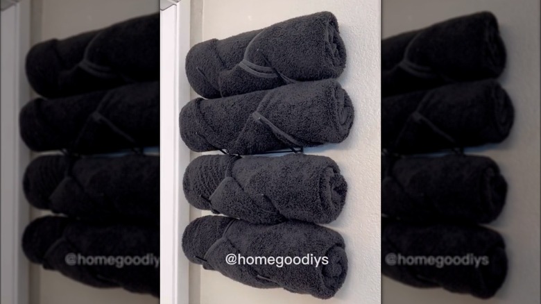 DIY towel rack holding towels