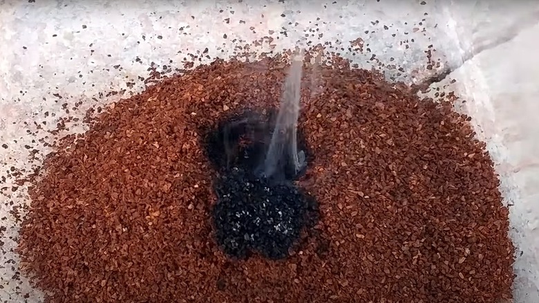 burning pile of ground coffee