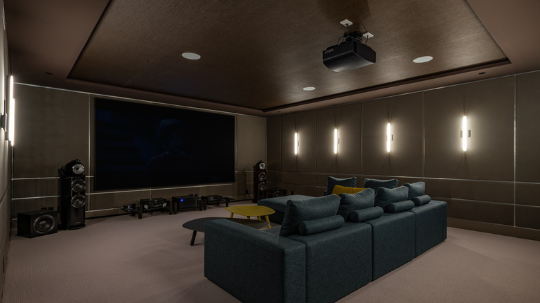 dark home theater with couch