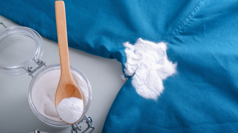 Powdered laundry product on armpit area of shirt