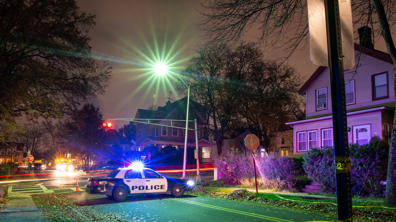 police car in front of house