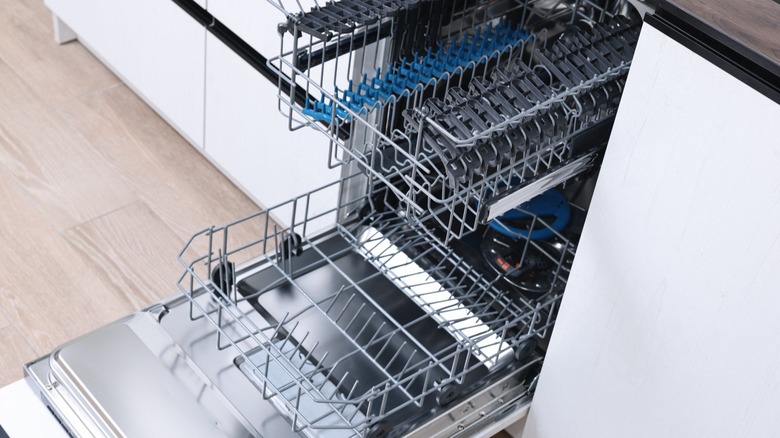 closeup of empty clean dishwasher