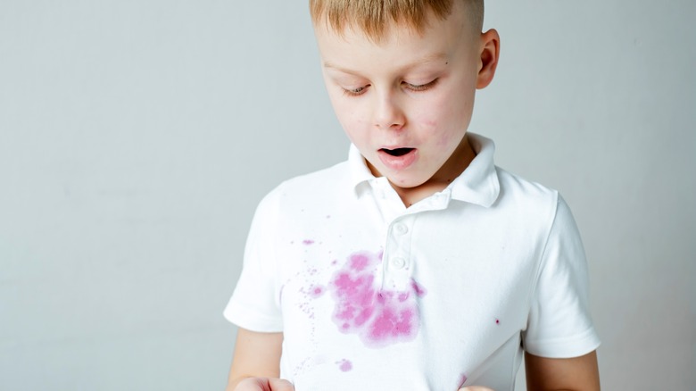 boy with stained shirt