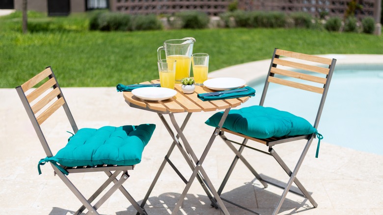 Patio table by the pool