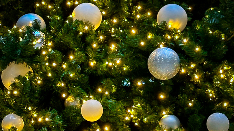 Shiny, multicolored ornaments on a tree