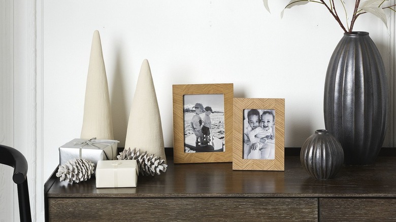 Matte white minimalist mini Christmas tree decor on top of a dresser