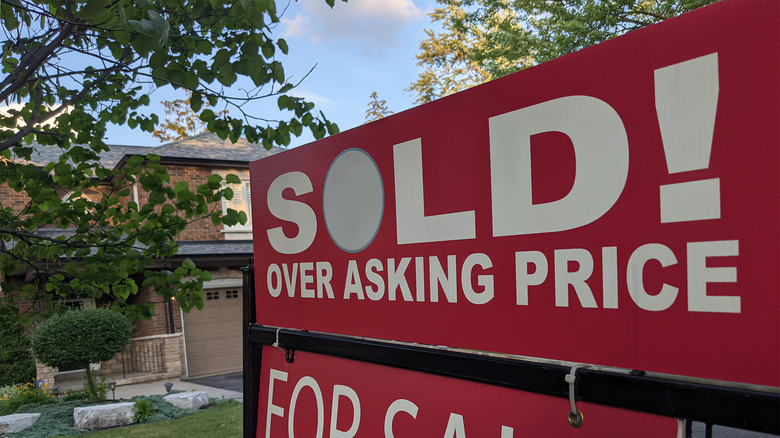 House sold sign