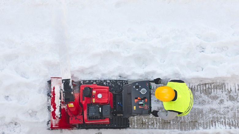 using a snowblower on driveway