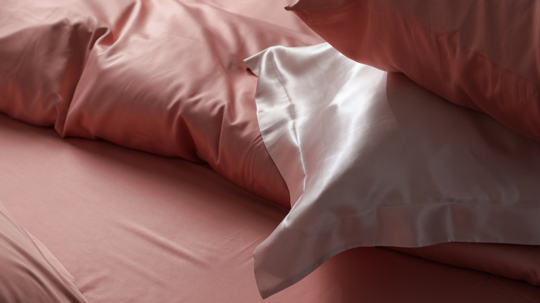 silk bedsheets and pillowcases that had stains removed